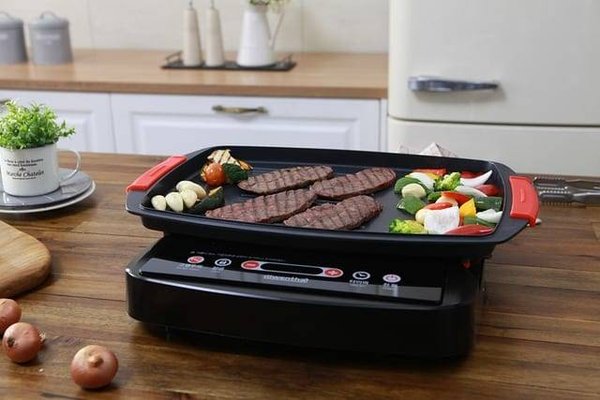 Maîtrisez l'art de la cuisson à la plancha avec une cloche de cuisson : Techniques et recettes